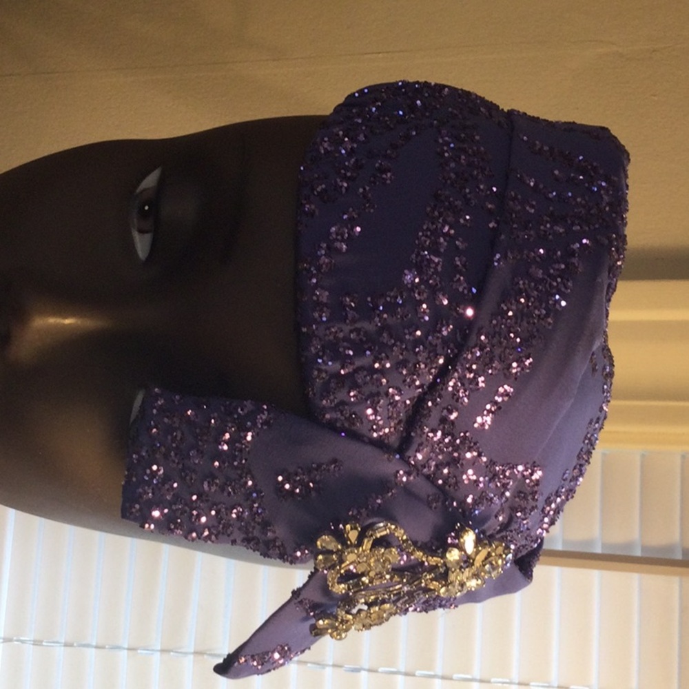 Custom designed purple rhinestone hat.